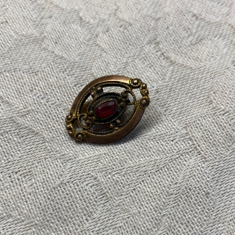 Antique Oval with Red Stone